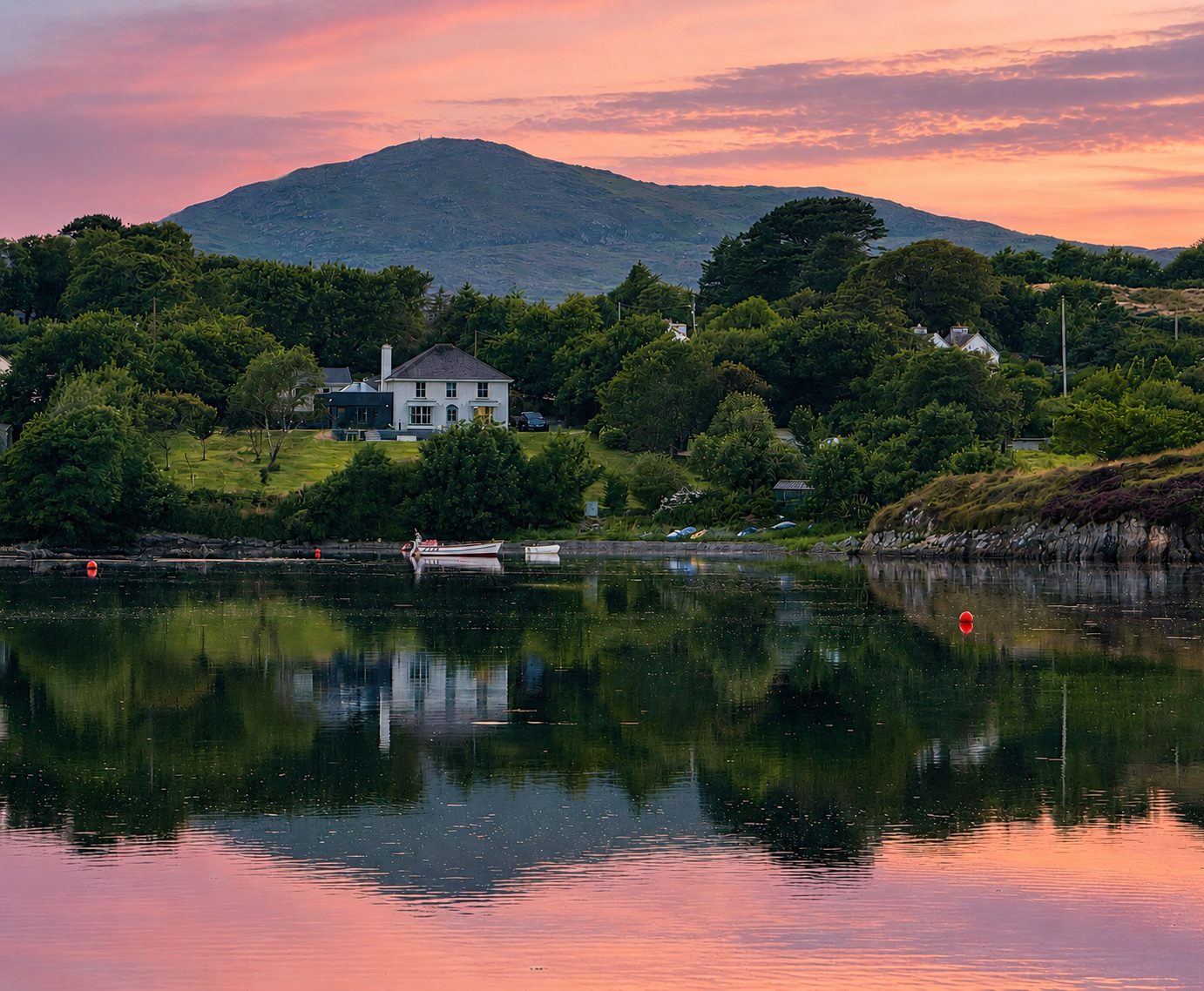 Strandville across Toormore Cove at sunset