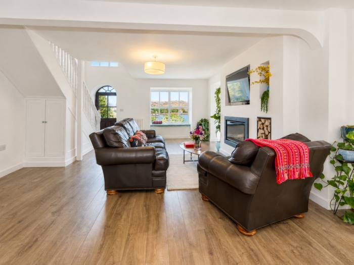 Sitting room with fireplace and view toward the garden